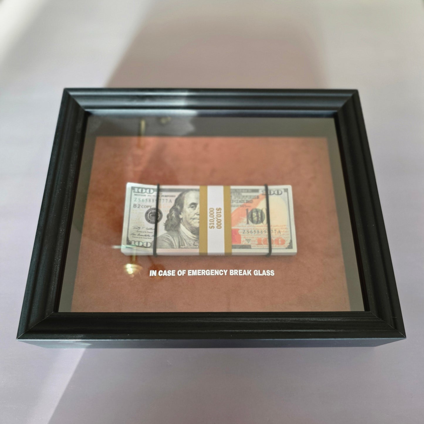 BREAK GLASS - $10,000 Frame